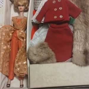 1961 collectable Barbie doll, case, and accessories